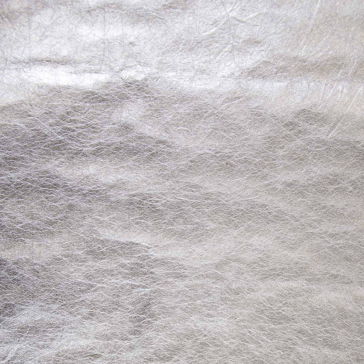 Close-up of textured metallic silver fabric