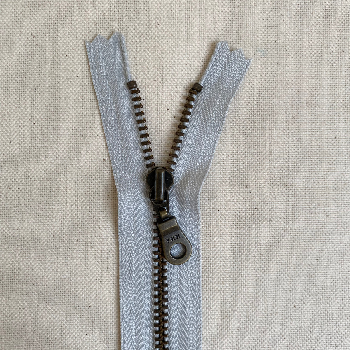 YKK No. 5 Antique Brass Metal Zip with NATULON® Recycled Tape - Closed End - MOONSHINE GREY