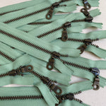 **MULTIPACK** YKK No. 3 Antique Brass Metal Zip with NATULON® Recycled Tape - Closed End - PEPPERMINT GREEN